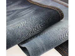 彈力牛仔布廠：牛仔褲具體的重量常見是多少？